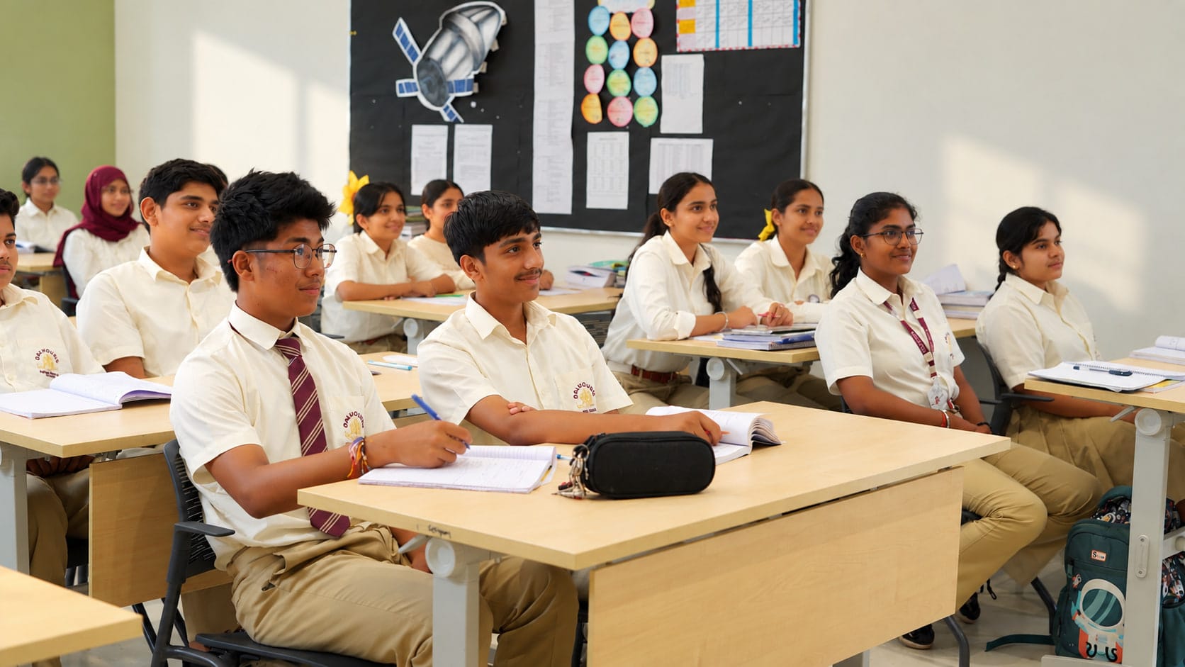 Students writing a test in a classroom
